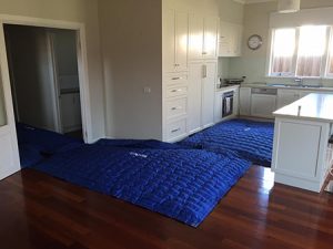 Heat drying on natural timber floors